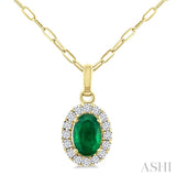6x4 MM Oval Shape Emerald and 1/6 Ctw Round Cut Diamond Halo Precious Pendant with Chain in 14K Yellow Gold