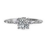 Fancy designed solitaire diamond ring with baugette and round shank details symbolizes everlasting love.