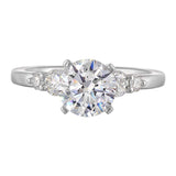 Five times diamonds for five times sparkles. A classic, lustrous band completes the look of this five stone engagement ring.