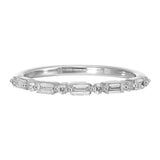 Baguettes and round diamonds dance in a dazzling duet around this band, set half the way around with comfort fit inside.
