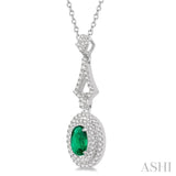 6X4 MM Oval Shape Emerald and 1/5 Ctw Round Cut Diamond Precious Pendant With Chain in 14K White Gold