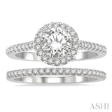 7/8 Ctw Round Cut Diamond Wedding Set With 3/4 Ctw Round Cut Engagement Ring and 1/6 Ctw Wedding Band in 14K White Gold