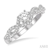 1/5 Ctw Entwined Semi-Mount Round Center Diamond Engagement Ring in 14K White Gold