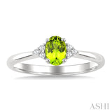 1/20 Ctw Oval Cut 6X4 MM Peridot and Round Cut Diamond semi-precious Ring in 10K White Gold
