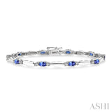 5x3 MM Oval Cut Tanzanite and 1/10 Ctw Bar and Oval Mount Round Cut Diamond Precious Bracelet in 10K White Gold