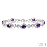 7x5 MM Oval Cut Amethyst and 1/10 Ctw Round Cut Diamond Semi-Precious Bracelet in Sterling Silver