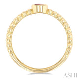 4x3 MM Oval Shape Ruby and 1/5 Ctw Single Cut Diamonds Precious Fashion Split Twin Ring in 10K Yellow Gold