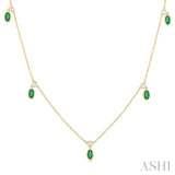 5x3 MM Oval Shape Emerald and 1/4 Ctw Round Cut Diamonds Precious Station Necklace in 14K Yellow Gold